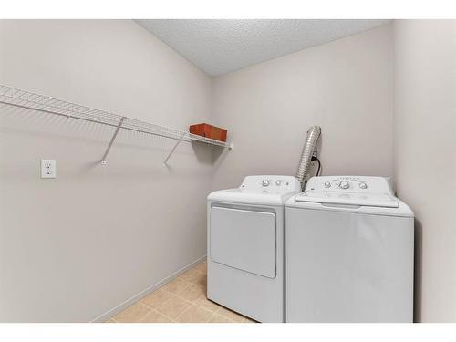 267 Copperstone Cove Se, Calgary, AB - Indoor Photo Showing Laundry Room