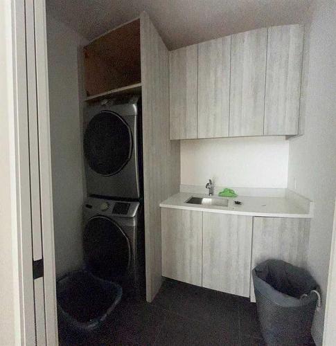 923 36A Street Nw, Calgary, AB - Indoor Photo Showing Laundry Room