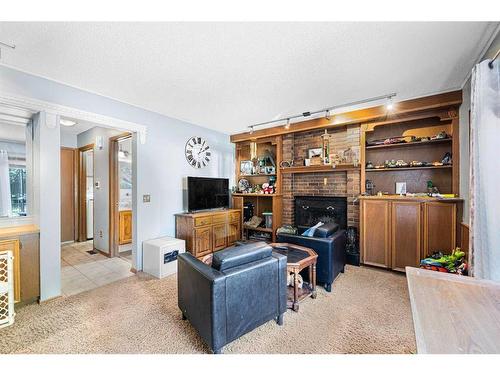 111 Wood Valley Court Sw, Calgary, AB - Indoor With Fireplace