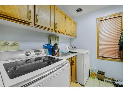 111 Wood Valley Court Sw, Calgary, AB - Indoor Photo Showing Laundry Room