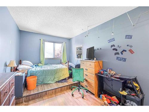111 Wood Valley Court Sw, Calgary, AB - Indoor Photo Showing Bedroom