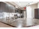 314-100 Cranfield Common Se, Calgary, AB  - Indoor Photo Showing Kitchen With Double Sink With Upgraded Kitchen 