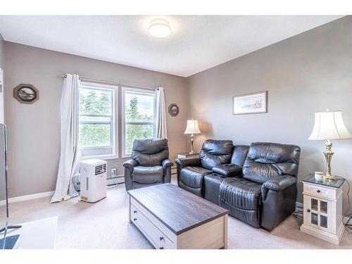 314-100 Cranfield Common Se, Calgary, AB - Indoor Photo Showing Living Room