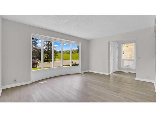 300 Berwick Drive Nw, Calgary, AB - Outdoor With Backyard