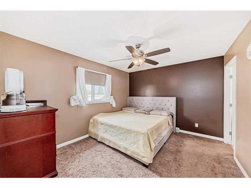 187 Silver Springs Way Nw, Airdrie, AB - Indoor Photo Showing Bedroom