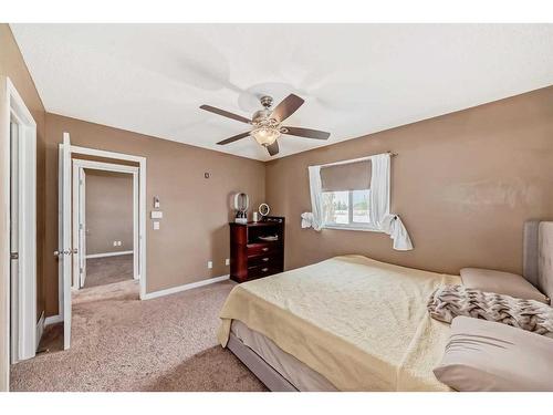 187 Silver Springs Way Nw, Airdrie, AB - Indoor Photo Showing Bedroom