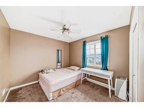 187 Silver Springs Way Nw, Airdrie, AB - Indoor Photo Showing Bedroom