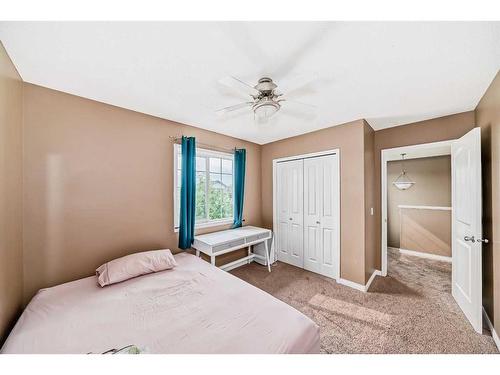 187 Silver Springs Way Nw, Airdrie, AB - Indoor Photo Showing Bedroom