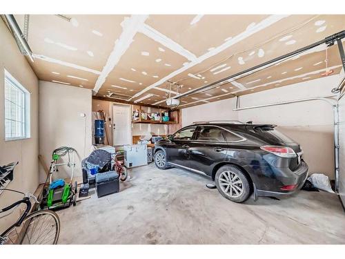 187 Silver Springs Way Nw, Airdrie, AB - Indoor Photo Showing Garage