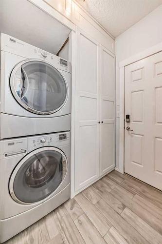 1204 New Brighton Drive Se, Calgary, AB - Indoor Photo Showing Laundry Room