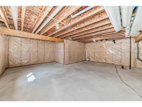 1204 New Brighton Drive Se, Calgary, AB - Indoor Photo Showing Basement