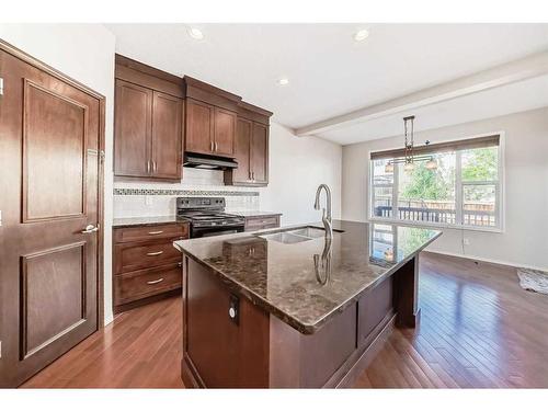 1204 New Brighton Drive Se, Calgary, AB - Indoor Photo Showing Kitchen With Upgraded Kitchen