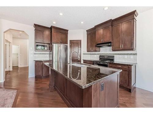 1204 New Brighton Drive Se, Calgary, AB - Indoor Photo Showing Kitchen With Upgraded Kitchen
