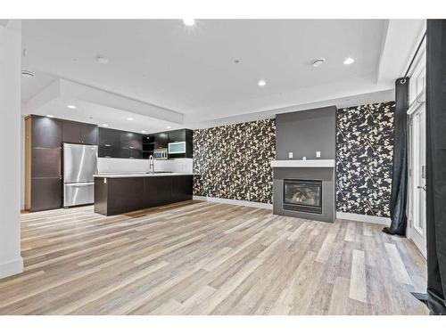 2-1717 27 Avenue Sw, Calgary, AB - Indoor With Fireplace