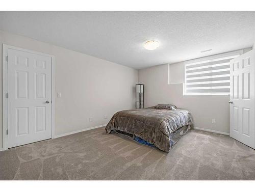 242057 209 Street West, Rural Foothills County, AB - Indoor Photo Showing Bedroom