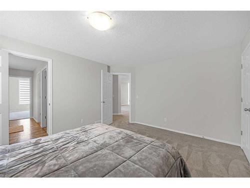 242057 209 Street West, Rural Foothills County, AB - Indoor Photo Showing Bedroom