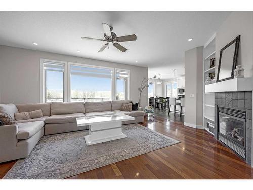 242057 209 Street West, Rural Foothills County, AB - Indoor Photo Showing Living Room With Fireplace