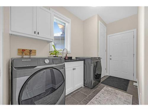 242057 209 Street West, Rural Foothills County, AB - Indoor Photo Showing Laundry Room