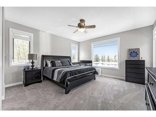 242057 209 Street West, Rural Foothills County, AB - Indoor Photo Showing Bedroom