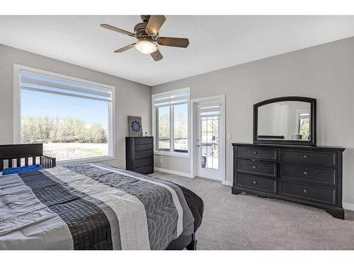 242057 209 Street West, Rural Foothills County, AB - Indoor Photo Showing Bedroom