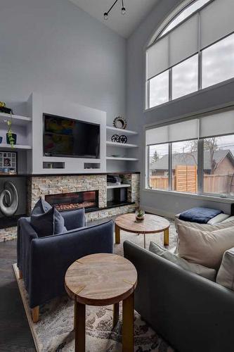 2007 24 Avenue Nw, Calgary, AB - Indoor Photo Showing Living Room With Fireplace