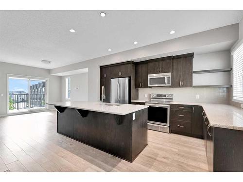 201 Nolanlake Villas Nw, Calgary, AB - Indoor Photo Showing Kitchen With Stainless Steel Kitchen With Upgraded Kitchen