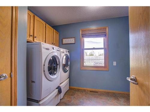 500 Minto Street, Granum, AB - Indoor Photo Showing Laundry Room