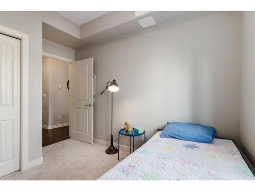 3101-522 Cranford Drive Se, Calgary, AB - Indoor Photo Showing Bedroom