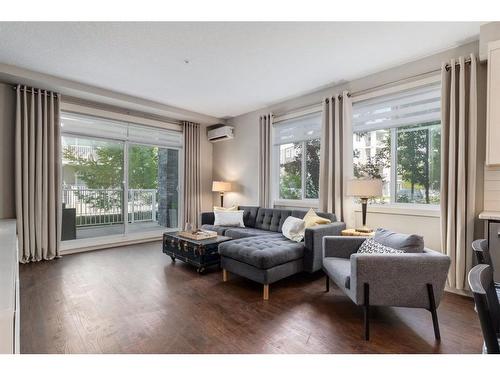 3101-522 Cranford Drive Se, Calgary, AB - Indoor Photo Showing Living Room