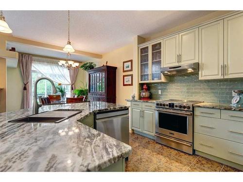 73 Cresthaven Way Sw, Calgary, AB - Indoor Photo Showing Kitchen With Stainless Steel Kitchen With Upgraded Kitchen