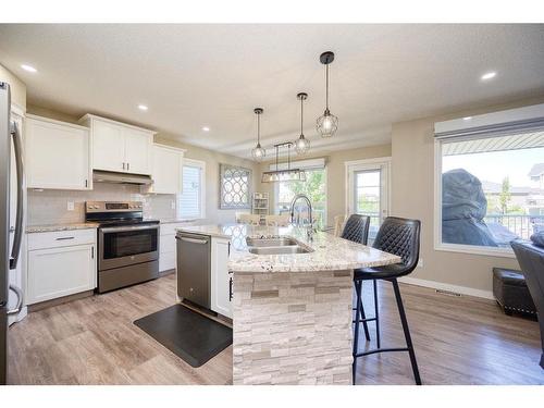 258 Bayside Point Sw, Airdrie, AB - Indoor Photo Showing Kitchen With Stainless Steel Kitchen With Double Sink With Upgraded Kitchen