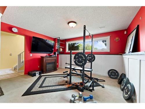 241 Madeira Crescent Ne, Calgary, AB - Indoor Photo Showing Gym Room