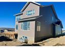 50 Heritage Cove, Cochrane, AB  - Outdoor With Exterior 