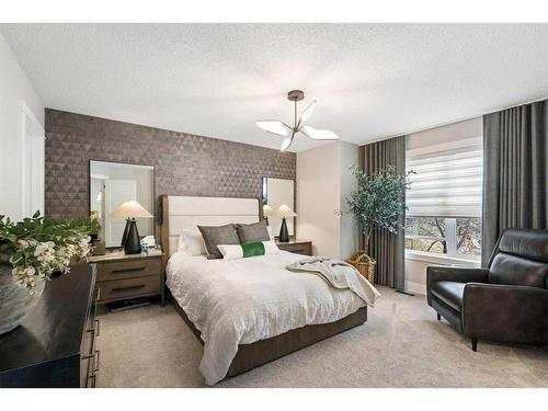166 Tuscany Valley Drive Nw, Calgary, AB - Indoor Photo Showing Bedroom