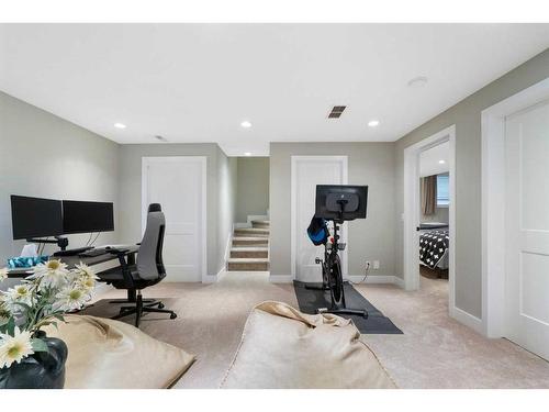166 Tuscany Valley Drive Nw, Calgary, AB - Indoor Photo Showing Gym Room
