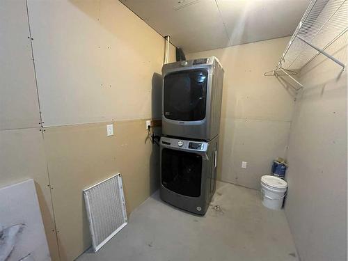 33 Covewood Close Ne, Calgary, AB - Indoor Photo Showing Laundry Room