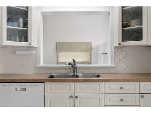 22 Coleridge Road Nw, Calgary, AB - Indoor Photo Showing Kitchen With Double Sink