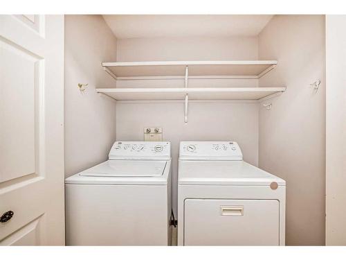 193 Sandstone Drive, Okotoks, AB - Indoor Photo Showing Laundry Room
