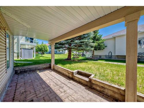 193 Sandstone Drive, Okotoks, AB - Outdoor With Deck Patio Veranda With Exterior