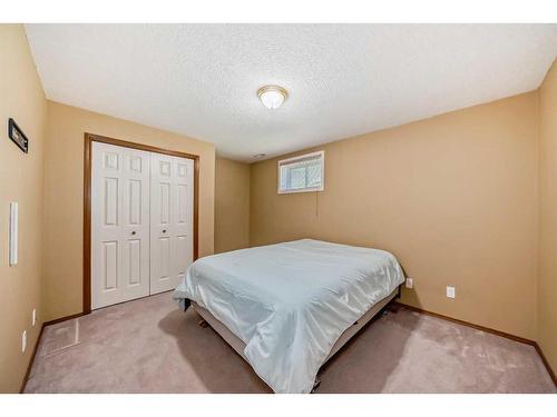 193 Sandstone Drive, Okotoks, AB - Indoor Photo Showing Bedroom