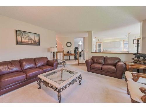 64 Coral Springs Boulevard Ne, Calgary, AB - Indoor Photo Showing Living Room