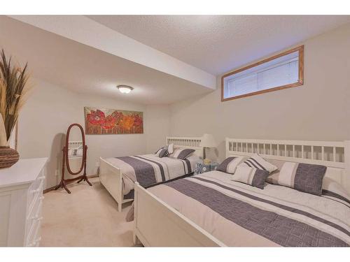 64 Coral Springs Boulevard Ne, Calgary, AB - Indoor Photo Showing Bedroom