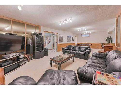 64 Coral Springs Boulevard Ne, Calgary, AB - Indoor Photo Showing Living Room