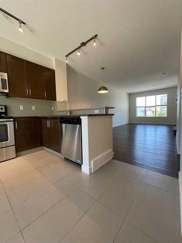 105 Sherwood Row Nw, Calgary, AB - Indoor Photo Showing Kitchen With Stainless Steel Kitchen