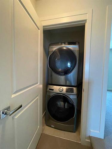 105 Sherwood Row Nw, Calgary, AB - Indoor Photo Showing Laundry Room