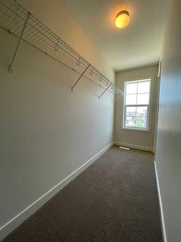 105 Sherwood Row Nw, Calgary, AB - Indoor With Storage