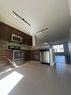 105 Sherwood Row Nw, Calgary, AB  - Indoor Photo Showing Kitchen With Stainless Steel Kitchen 