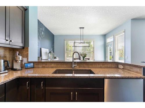 75 Chaparral Valley Way Se, Calgary, AB - Indoor Photo Showing Kitchen With Double Sink