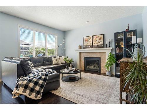 75 Chaparral Valley Way Se, Calgary, AB - Indoor Photo Showing Living Room With Fireplace