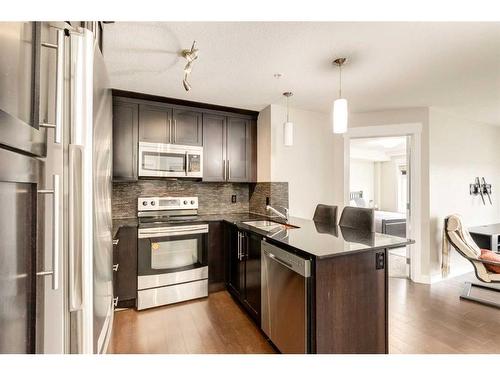 4305-155 Skyview Ranch Way Ne, Calgary, AB - Indoor Photo Showing Kitchen With Stainless Steel Kitchen With Double Sink With Upgraded Kitchen